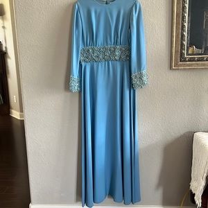 Vintage Carrie Couture Full length sky blue beaded gown fully lined.